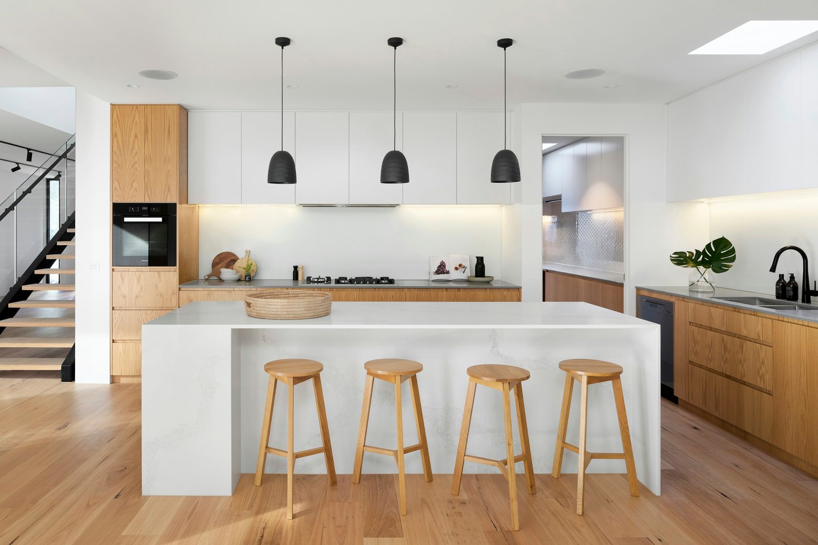 A modern open living space with warm, livable details.